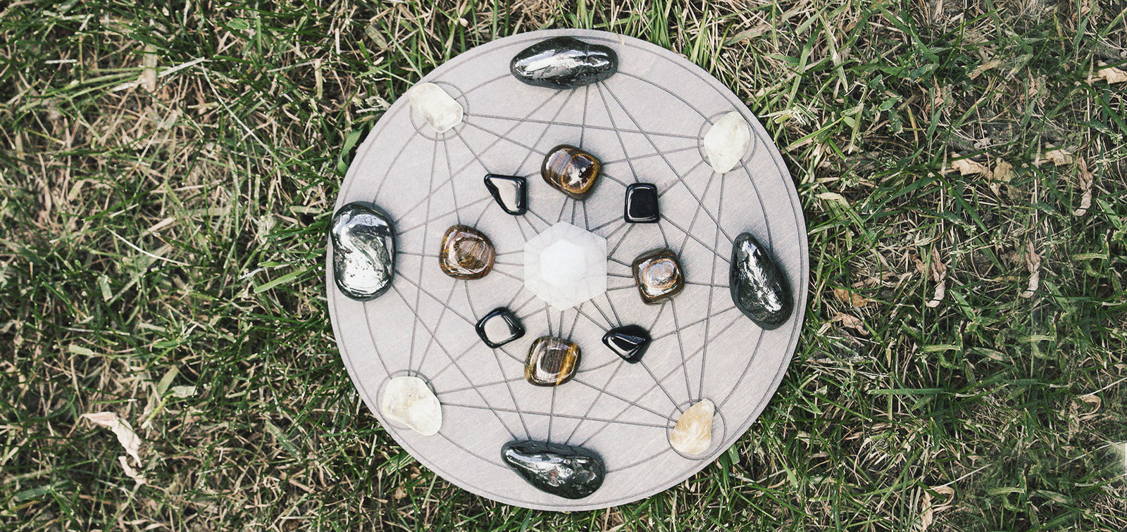 crystal grid with crystal set up on grass